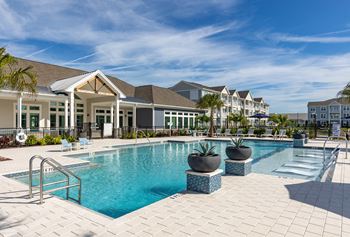 Resort style pool with tanning ledge & sundeck